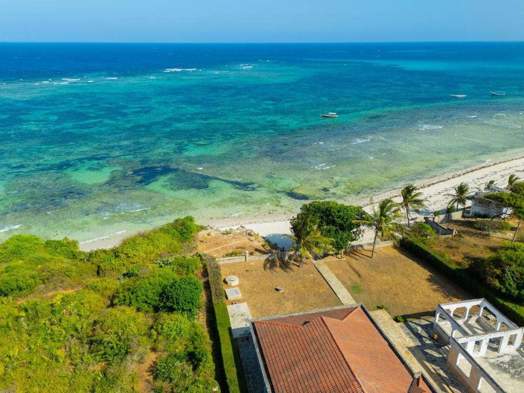 an aerial view of a beach and the ocean at Solana Pearl Beach Private Villa in Tiwi