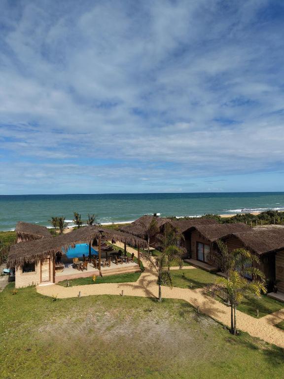 an aerial view of a resort on the beach at Pousada Nitxi Awêry in Caraíva
