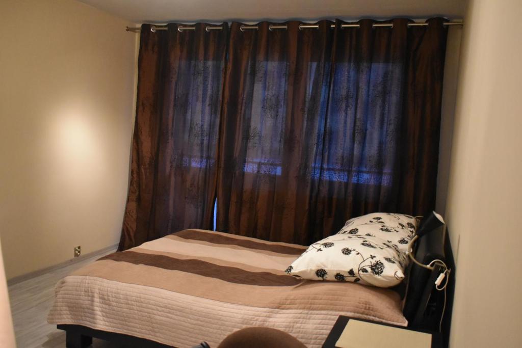 Posteľ alebo postele v izbe v ubytovaní Apartment 6 Gwiazdek