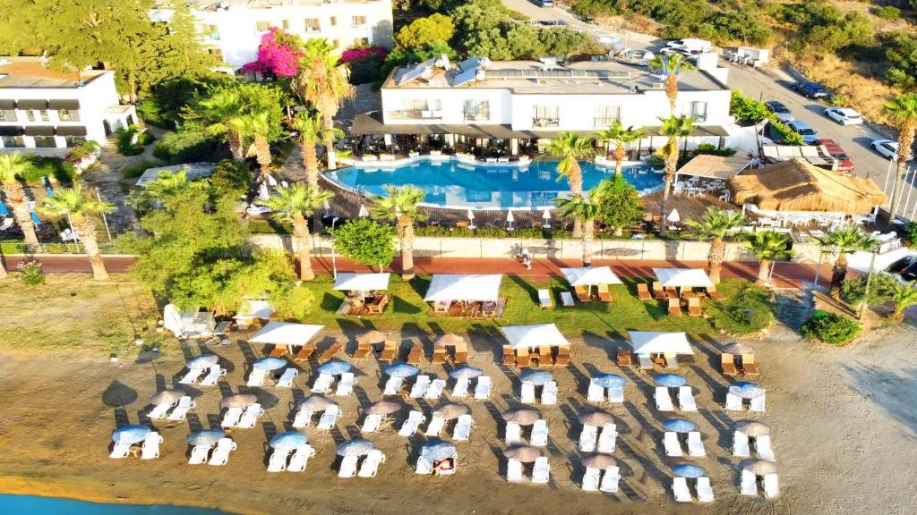 an aerial view of a resort with a swimming pool at Mira Beach Resort Bodrum - All inclusive in Bodrum City