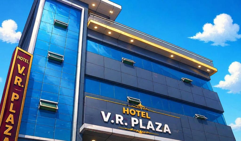 a hotel vr plaza with a blue building at Hotel VR Plaza in Etah