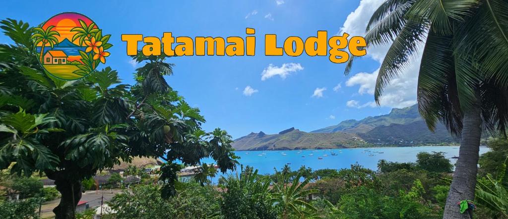 a view of a lake with a palm tree at Tatamai Lodge in Nuku Hiva