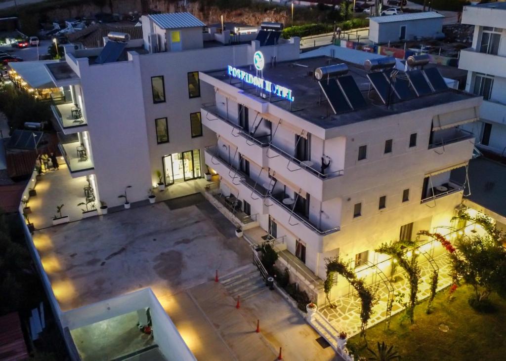 an overhead view of a building at night at Poseidon Family Hotel Ksamil in Ksamil