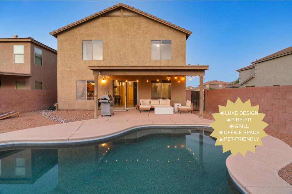 a house with a swimming pool in front of a house at Cactus Retreat Pool Fire Pit Pet Friendly in Green Valley