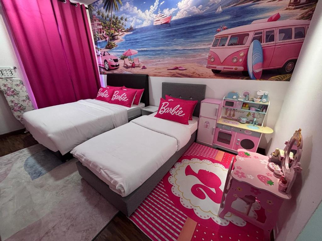 a small bedroom with two beds and a toy van at K Avenue by Stay & Unwind Suites in Donggongon