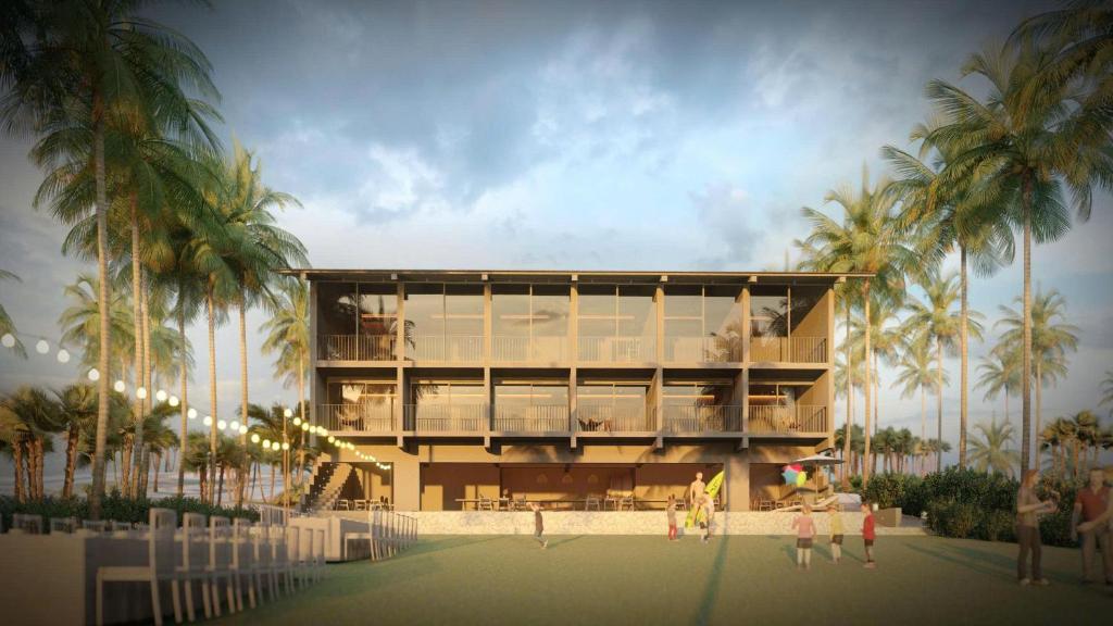 a rendering of a building with palm trees at Rucha Beachfront Retreat in Ấp An Lộc A