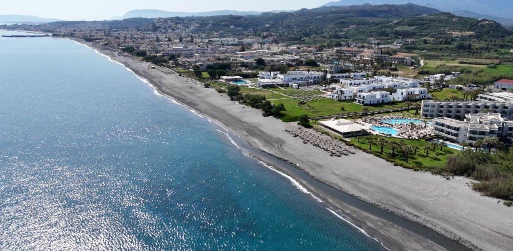 an aerial view of a beach and the ocean at Stamatakis Boutique Studios in Platanias