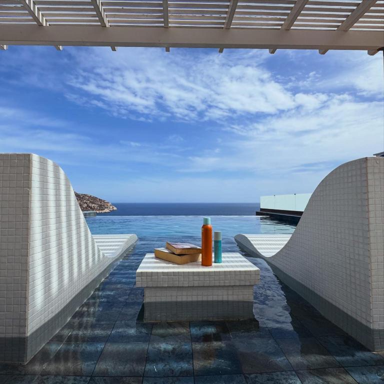 a view of the ocean from the patio of a resort at Aqua Blue Villa in Amoopi