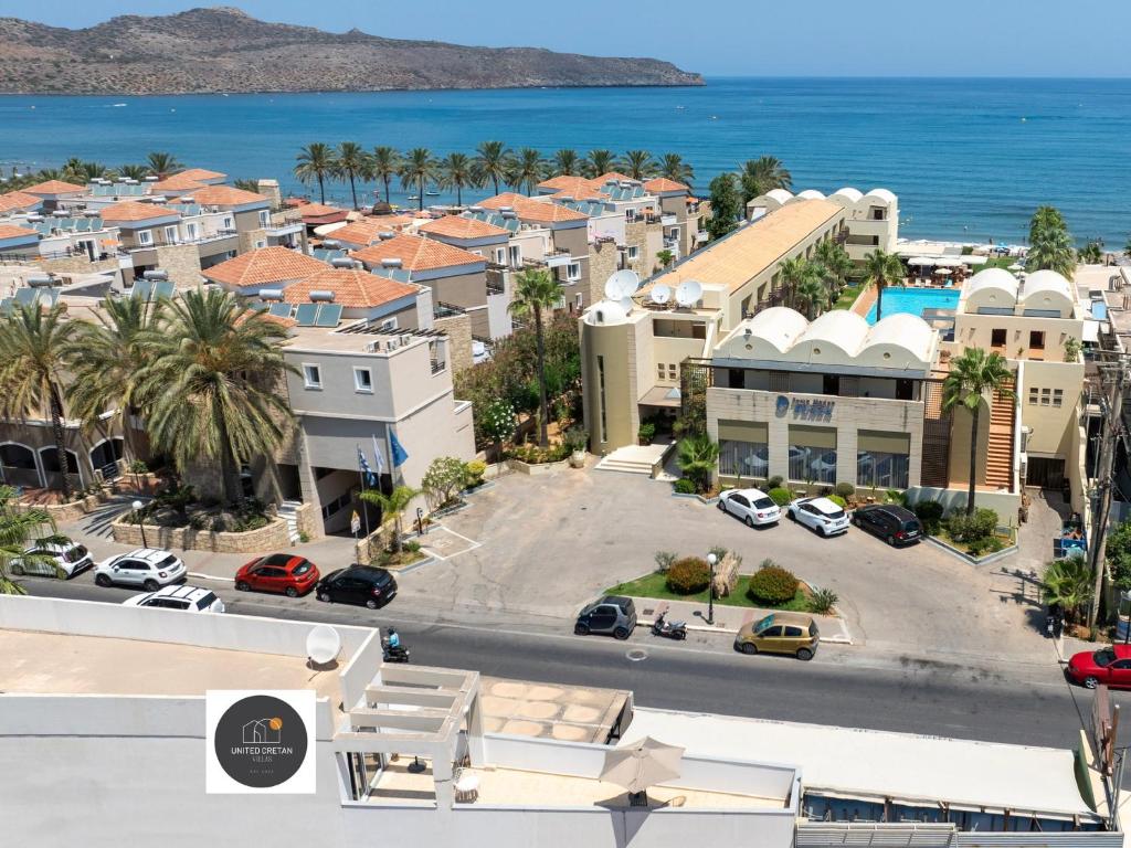 an aerial view of a city with the ocean at United Cretan Villas Boutique Studio in Agia Marina Nea Kydonias