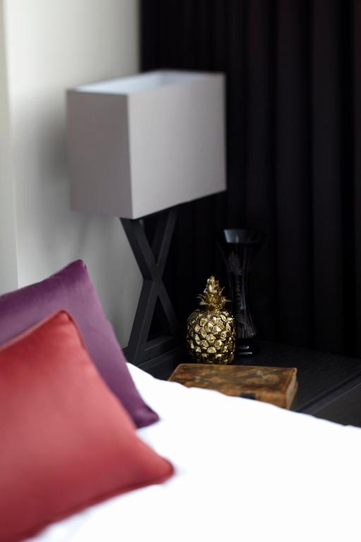 Postel nebo postele na pokoji v ubytování Hotel Xanadu