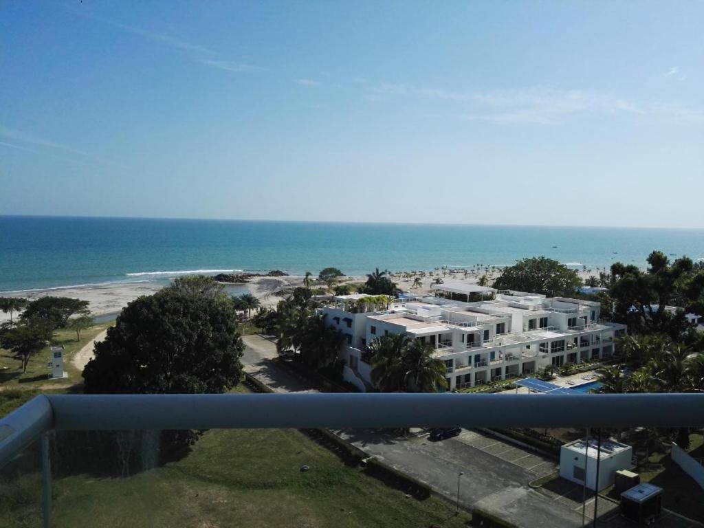 a view of the beach from the balcony of a hotel at Playa Blanca Ocean ll in Playa Blanca