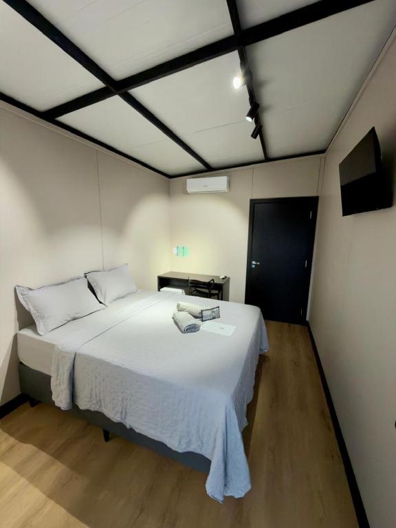 a bedroom with a large white bed in a room at Suite Home Sinop in Sinop