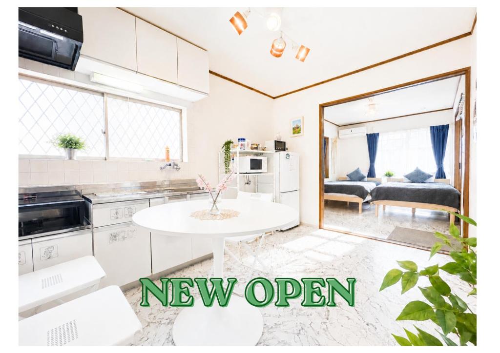 a new open kitchen and living room in a house at Quiet Myoden-Disney & Tokyo Sightseeing Base in Ichikawa