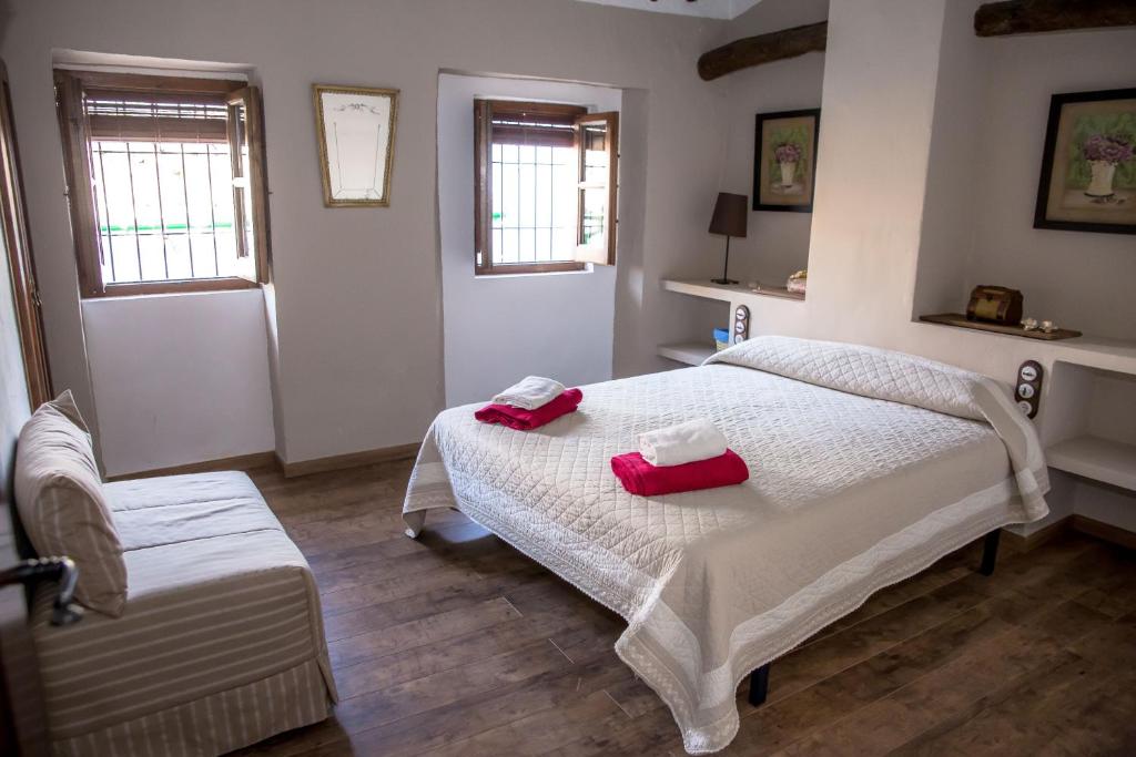 Postel nebo postele na pokoji v ubytování Casa Rural Zambra
