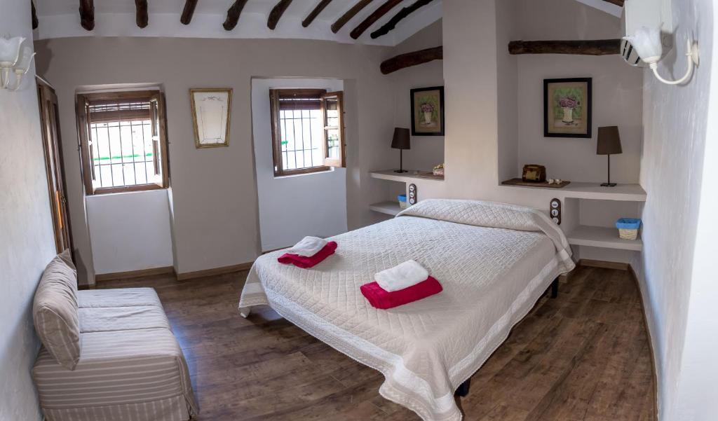 Postel nebo postele na pokoji v ubytování Casa Rural Zambra