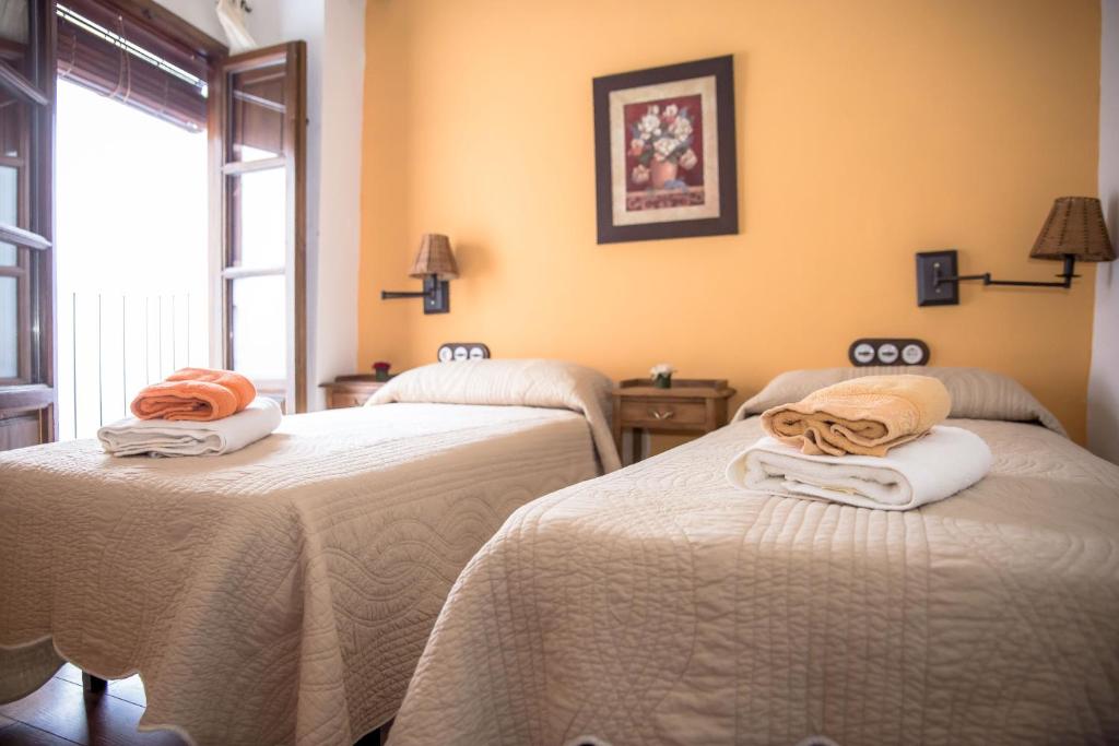 Postel nebo postele na pokoji v ubytování Casa Rural Zambra