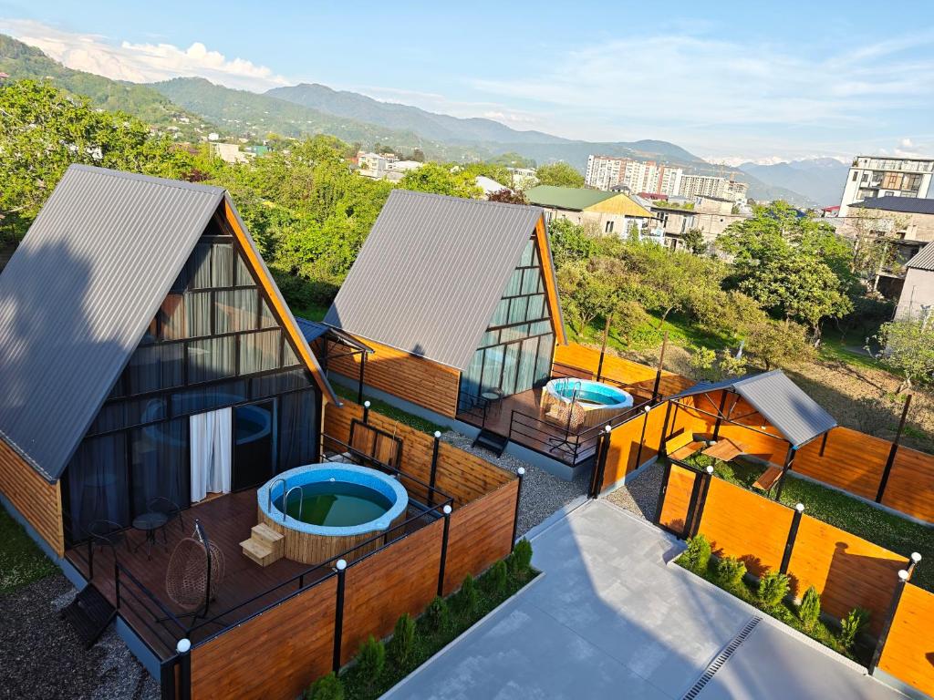 an overhead view of a house with a swimming pool at Golden Coast in Batumi