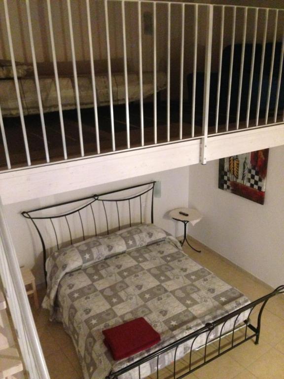 Postel nebo postele na pokoji v ubytování Pietra Bianca