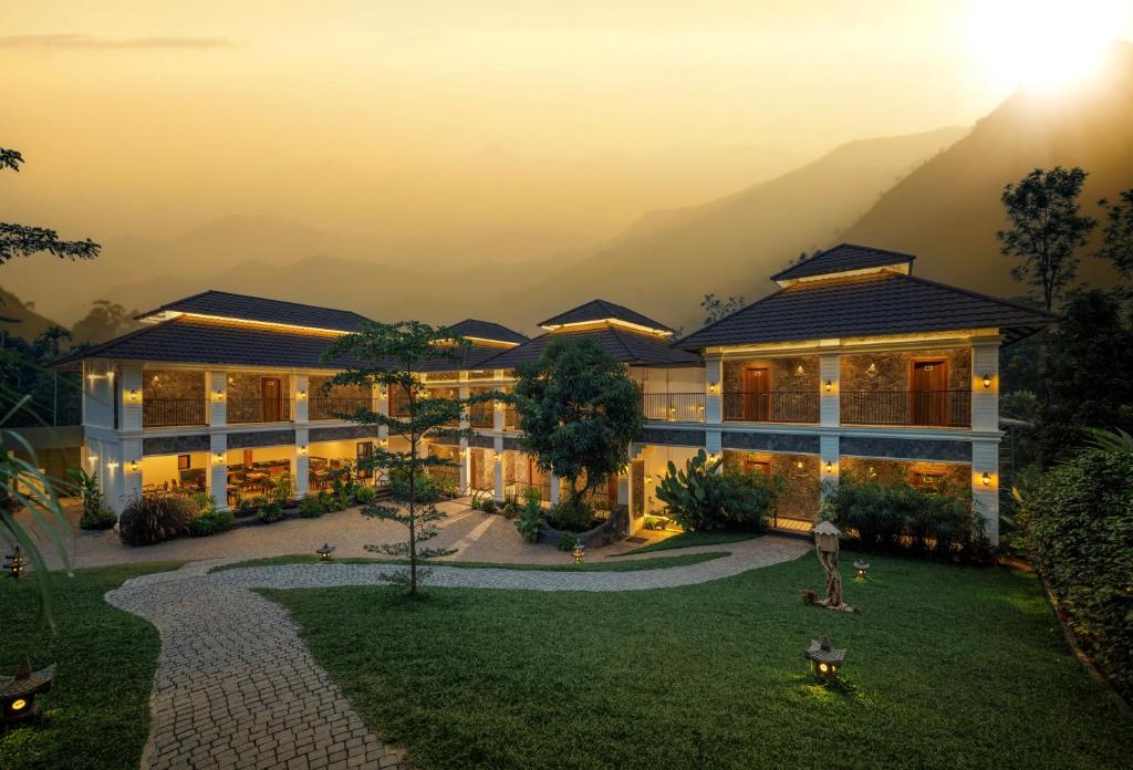 an image of a building at night at The Feel Munnar Resort in Munnar