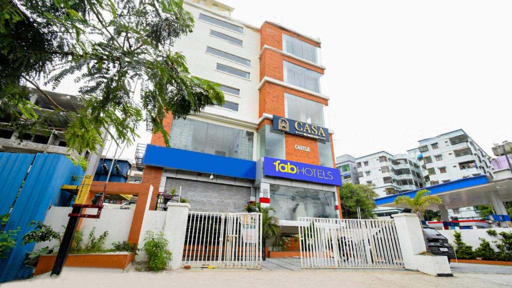 a building with a sign that reads units at FabHotel Casa Grand Ecil in Hyderabad