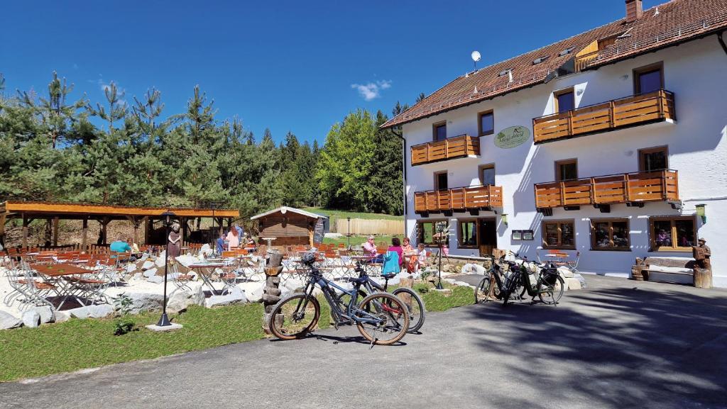 a group of bikes parked in front of a building at pfefferHÄUSL in Regen