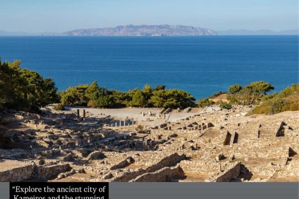 a view of the ancient city of paphos and the ocean at Villa Nostra Airport Pick-Up Service in Soroni