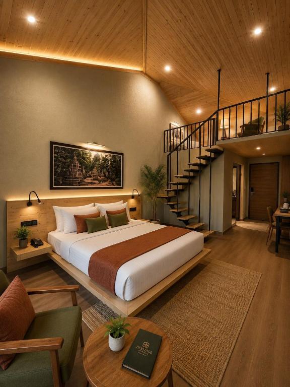 a bedroom with a large bed and a staircase at Heritage Resort's Jageshwar in Jageshwar