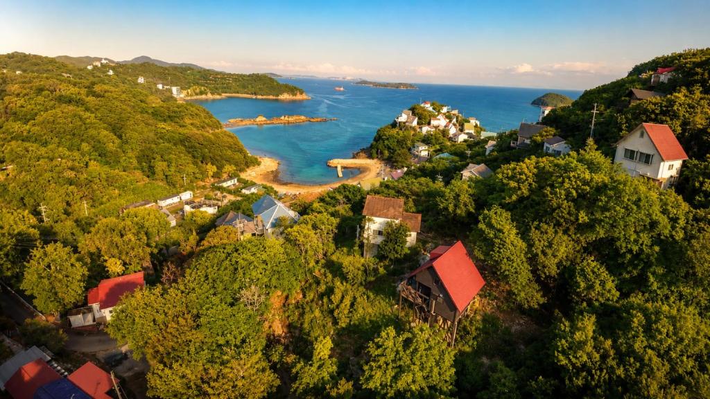 an aerial view of a small town with a lake at Affordable Island Villa with Sea Views Great Value Stay in Bizen