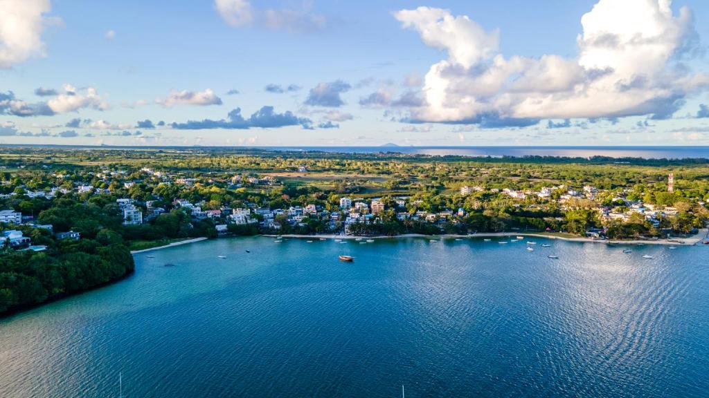 an aerial view of a lake with boats in it at Le Dodo Appartements in Trou d'Eau Douce