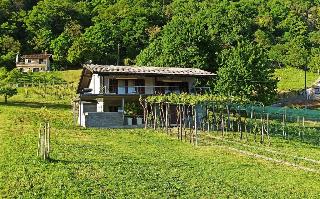 a small house in the middle of a field at Panorama in Klanjec