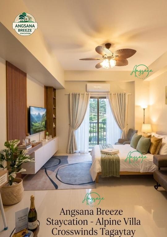 a bedroom with a bed and a ceiling fan at Angsana Breeze-Alpine Crosswinds Tagaytay in Ulot