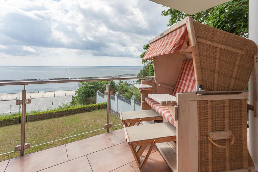 a balcony with a view of the beach at Villa Friede-Marie App Freya in Sassnitz
