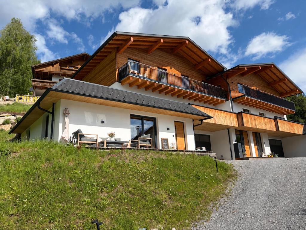 a house on the side of a hill at Appartement Bergwild in Bürserberg