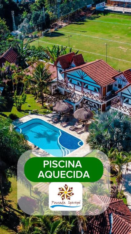 an aerial view of a resort with a swimming pool at Pousada Igarapé in Socorro