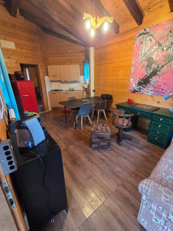 an overhead view of a living room with a ping pong table at La Baita di Lusso Bagnone in Bagnone