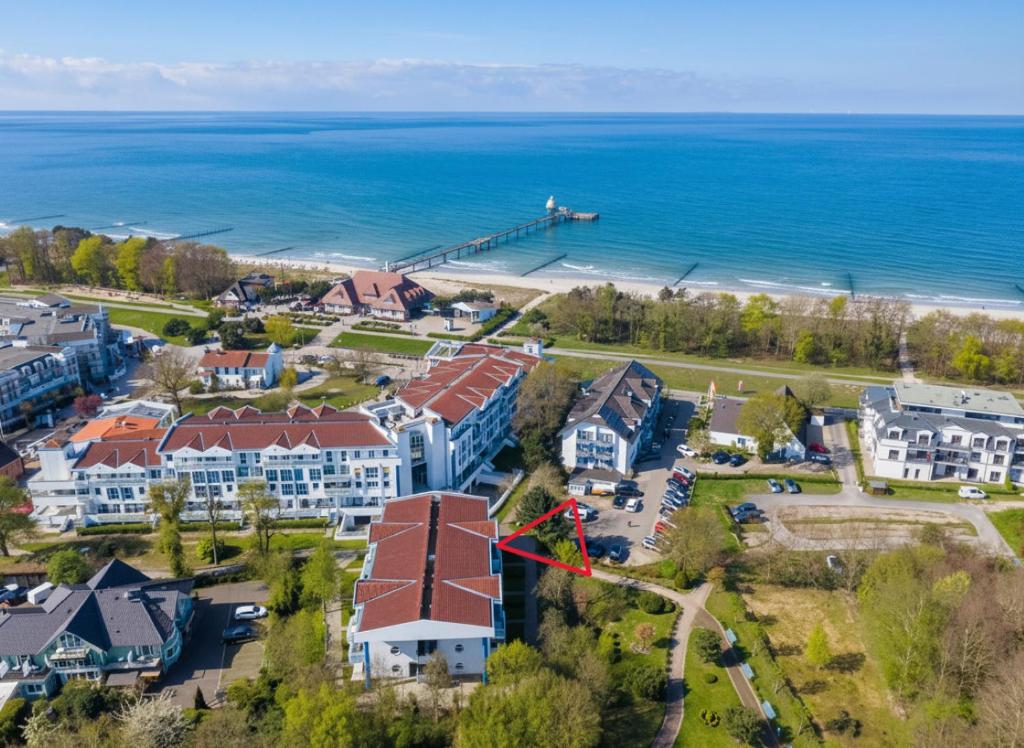 an aerial view of a resort with the ocean at Mein-Zingst-Urlaub in Zingst
