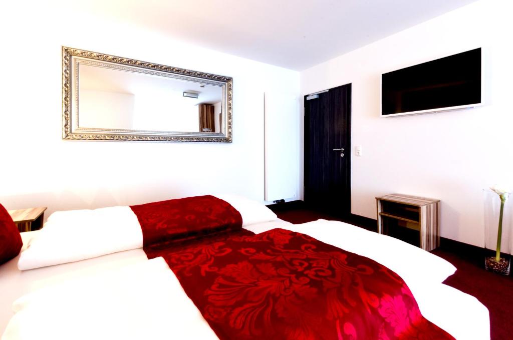 Postel nebo postele na pokoji v ubytování Hotel Bruckertshof