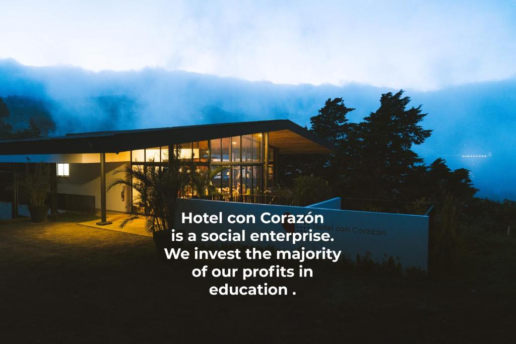 a building with the words hotel con convention is a social enterprise at Hotel con Corazon Monteverde in Monteverde Costa Rica