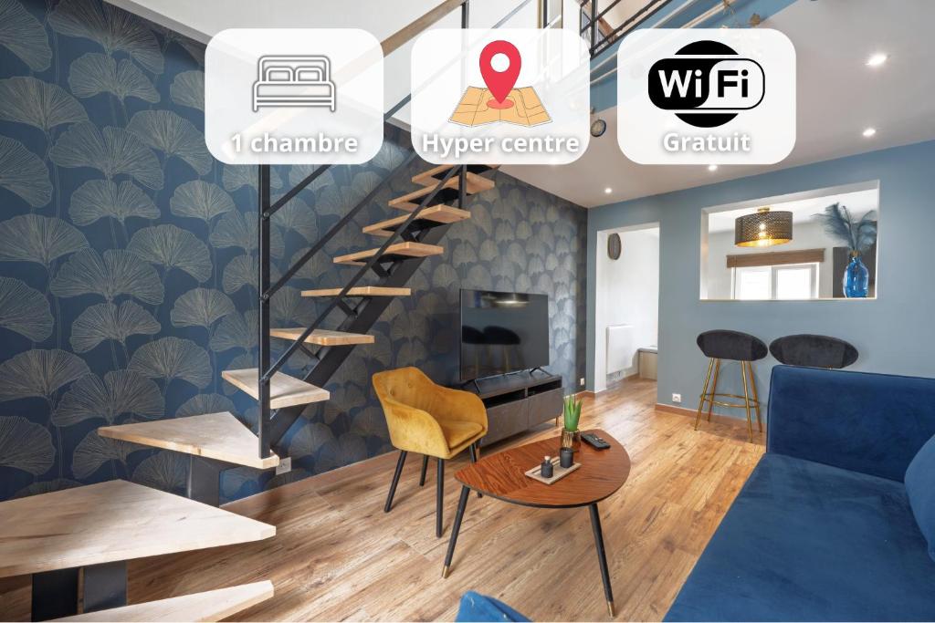 a room with a spiral staircase with a couch and a table at Le 29 - T2 Calme - Confortable - Centre-ville in Valenciennes