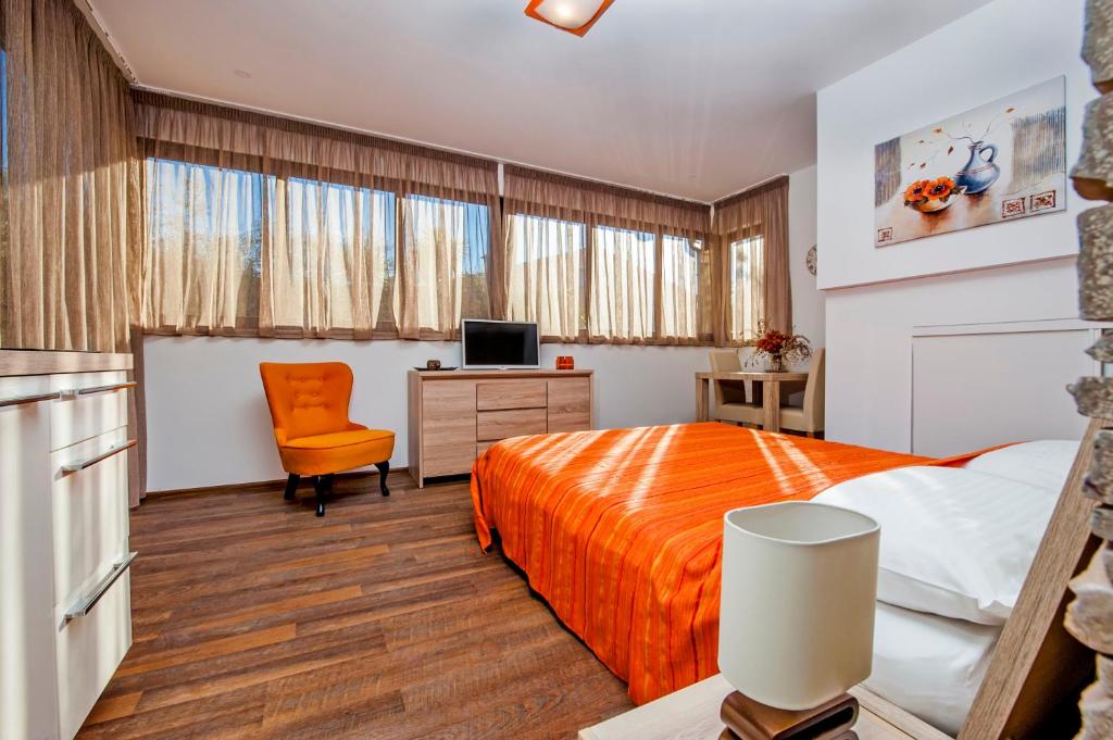 Postel nebo postele na pokoji v ubytování Apartments Figarola