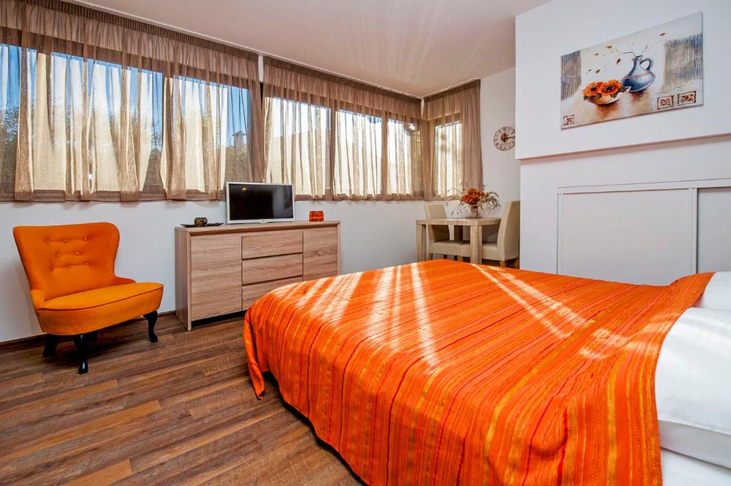 Postel nebo postele na pokoji v ubytování Apartments Figarola