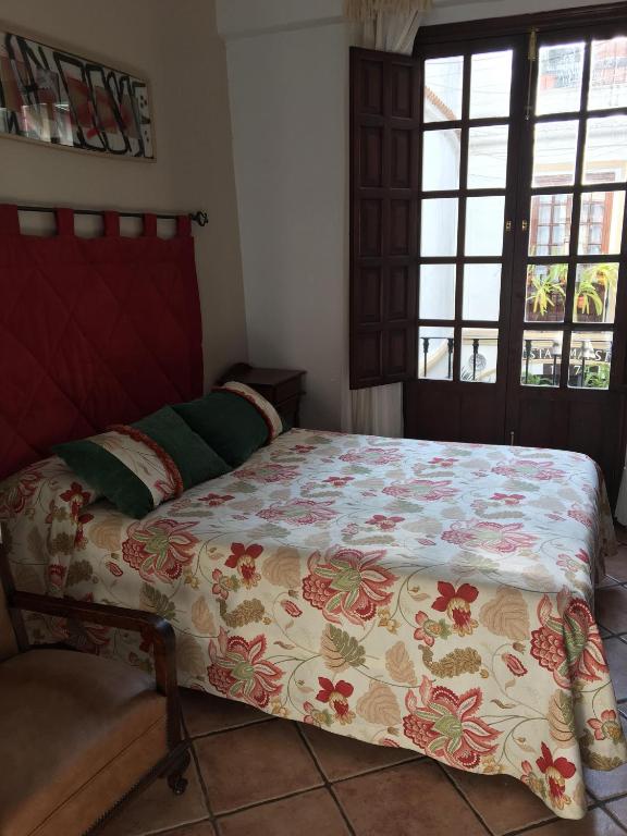 Postel nebo postele na pokoji v ubytování Hostal Maestre