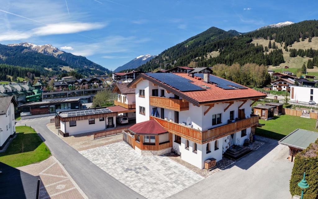 an aerial view of a house in the mountains at Beim Franz in Lermoos
