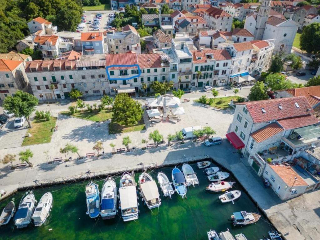 an aerial view of a harbor with boats at Sea View Apartment No3 Kaštela in Kaštela
