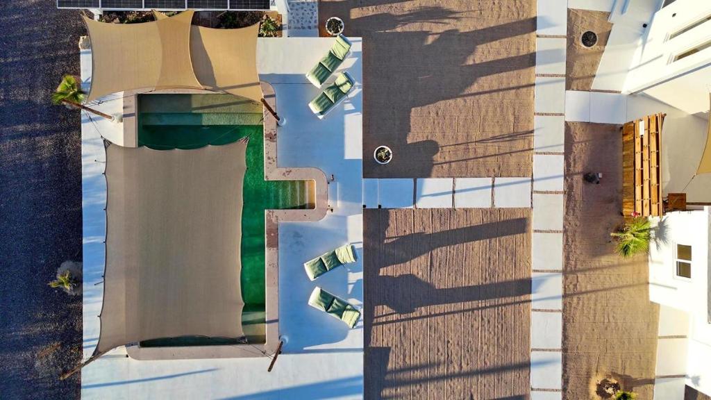 an overhead view of a building with money at SUNRISE Heated Pool Ocean View Walk to beach in La Ventana