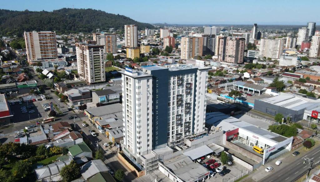 an overhead view of a city with tall buildings at Departamento Blanco Encalada in Temuco