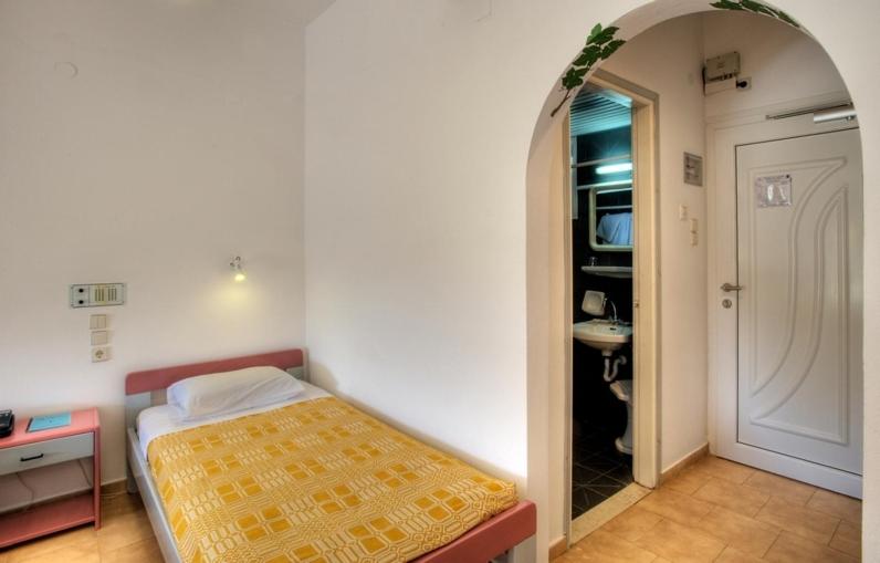Postel nebo postele na pokoji v ubytování Armonia Hotel