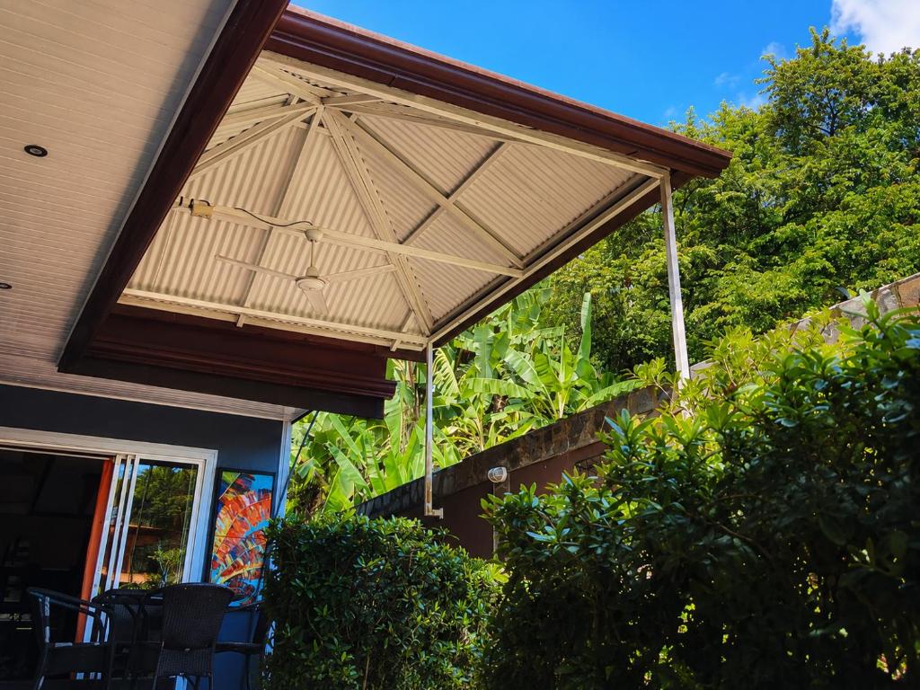 awning on the side of a house at Casa Olas in Quepos