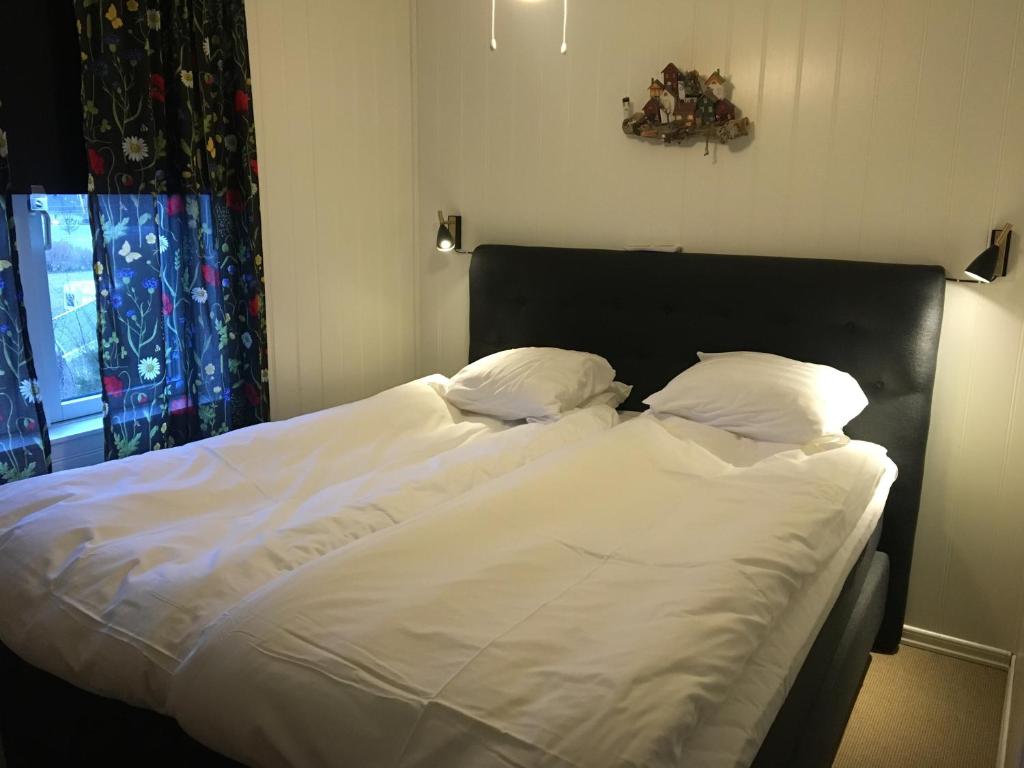 Postel nebo postele na pokoji v ubytování Pensionat Frillesberg