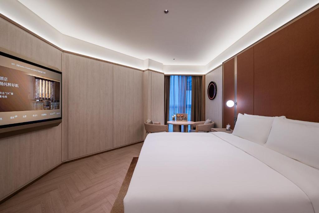 لابی و فضای عمومی Crystal Hotel Beijing Shunyi Capital International Convention Center - تصویر ۵
